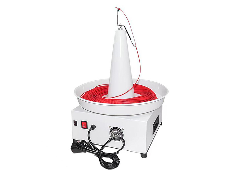 JMK Small automatic payoff and feeder reel